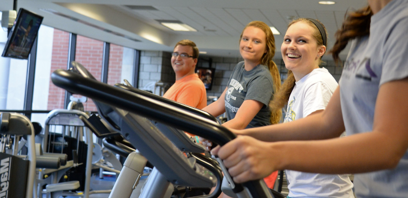 Students using the treadmills in the gym